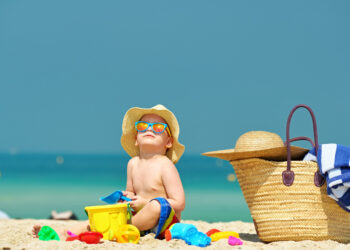 Essentials items to pack for a day at the beach with kids