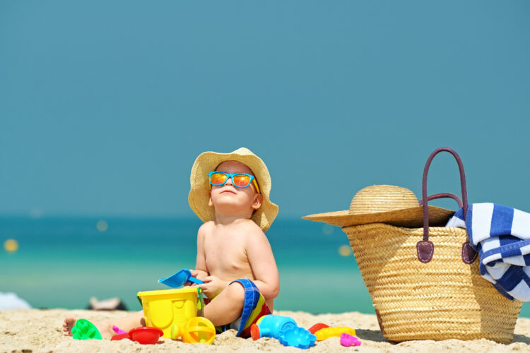 Essentials items to pack for a day at the beach with kids