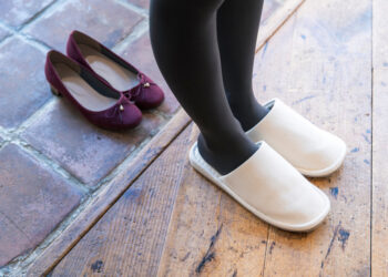 Why must you never wear shoes in the house?